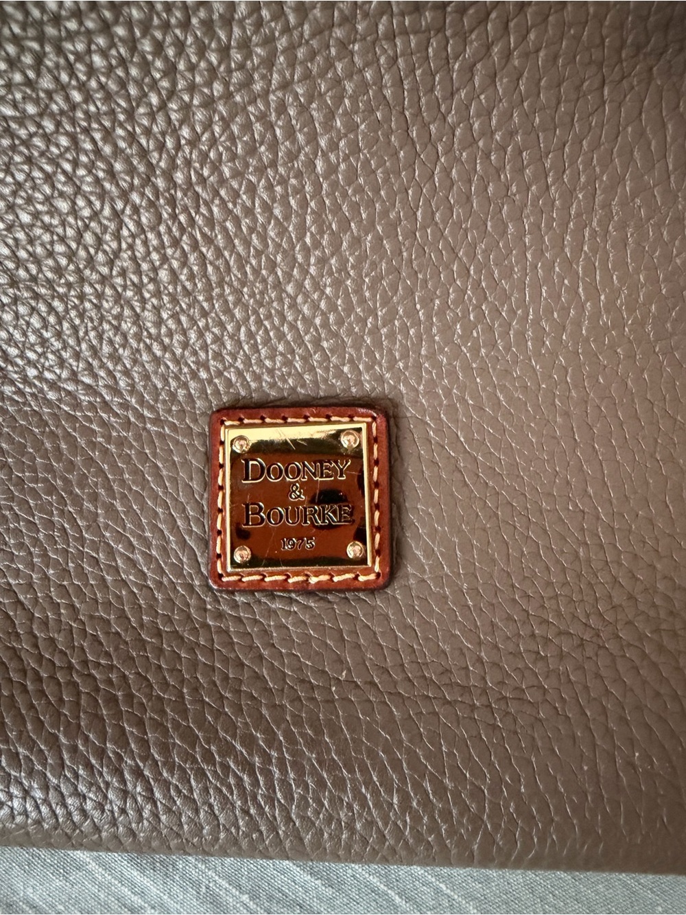 Dooney & Bourke Pebbled Taupe Leather Shoulder Bag with Gold Plaque